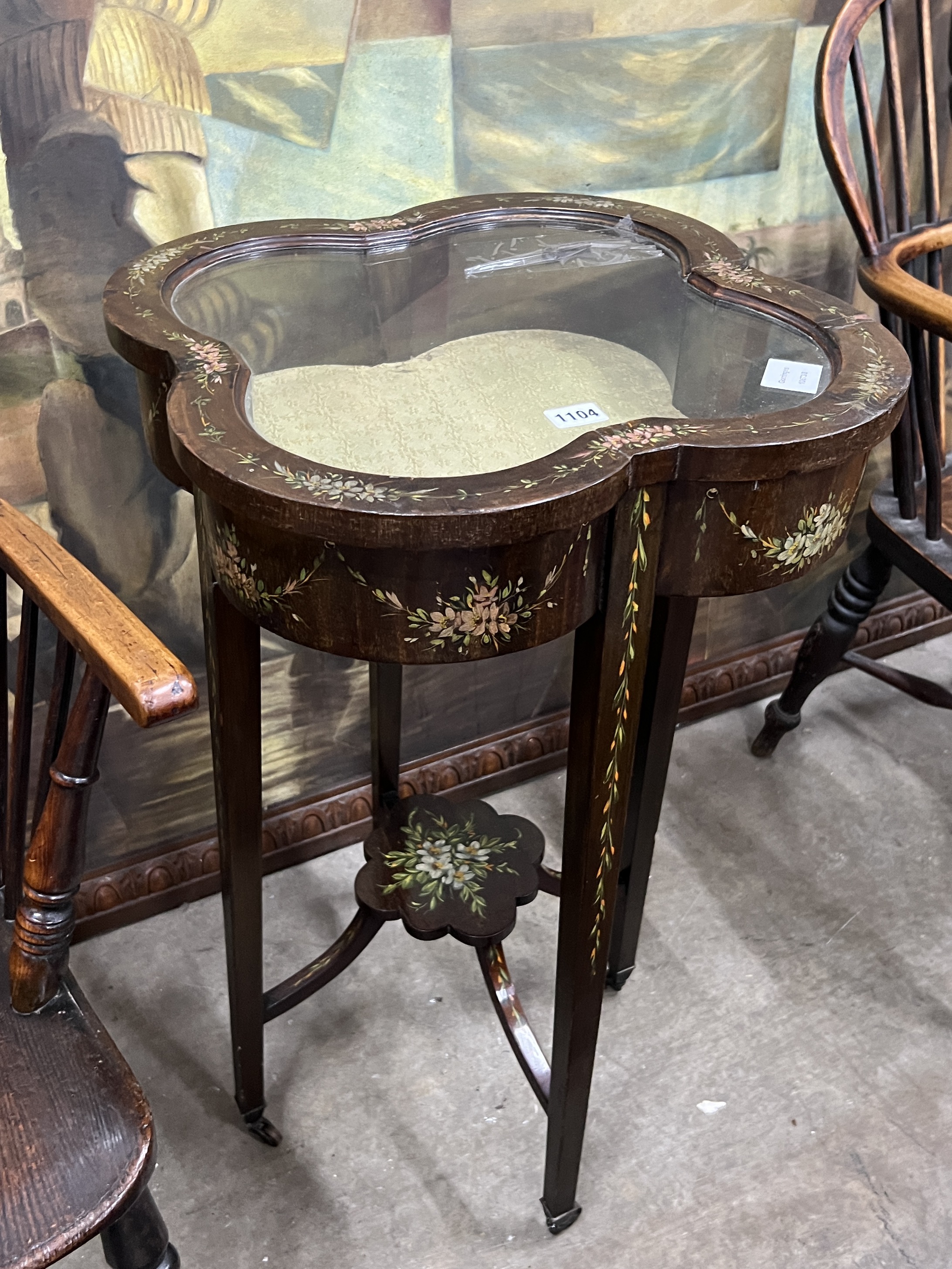 An Edwardian painted bijouterie table of lobed square form, width 44cm, height 77cm